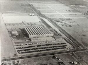 Aerial view of the Hawthorne Historical Society building and surrounding grounds in black and white.