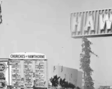 Historic Hawthorne sign and community board at the Hawthorne Historical Society, showcasing local history and upcoming events in Hawthorne, California.